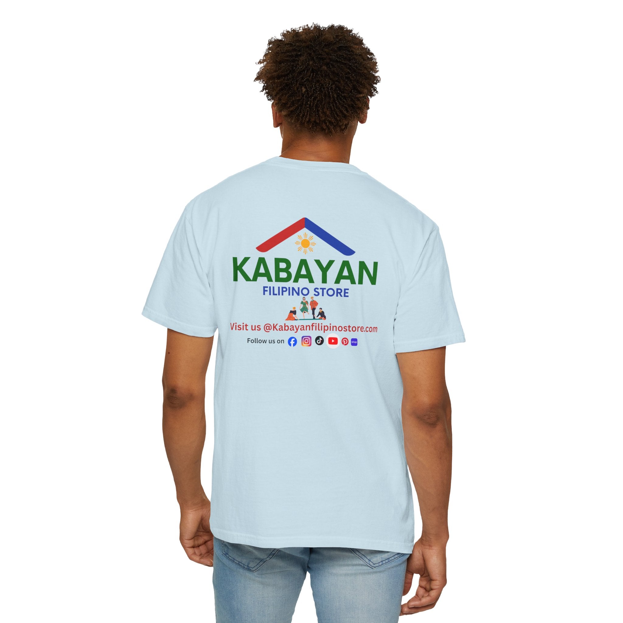 Person wearing a light blue t-shirt with 'Kabayan Filipino Store' logo and text on the back.